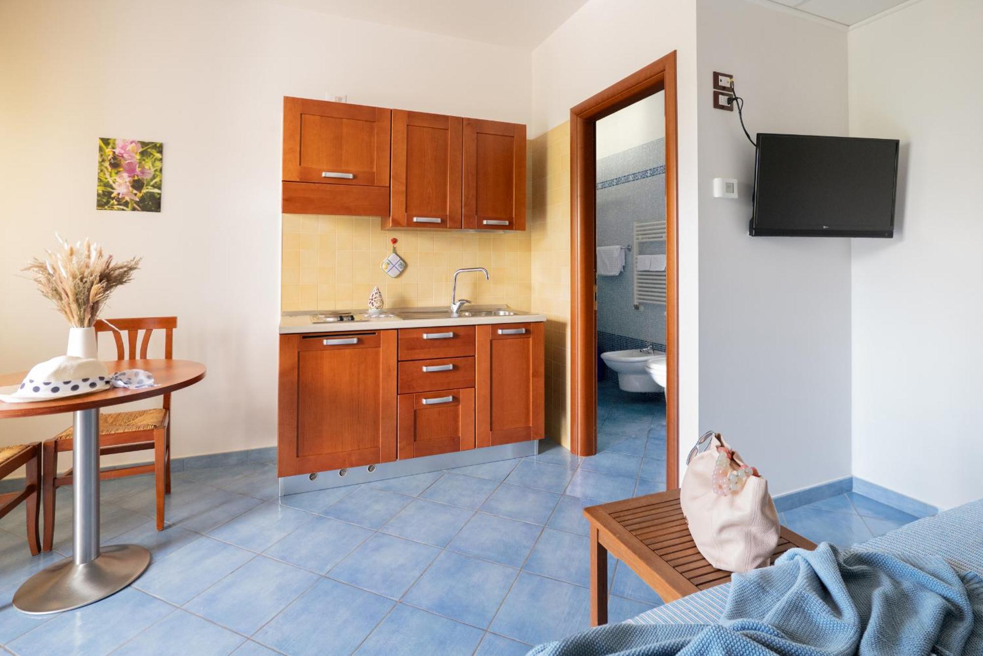 Hotel Residence Torre Del Porto Mattinata Quarto foto